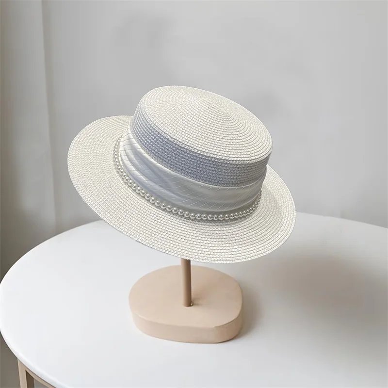 Elegant Women s Wide Brim Straw Hat with Pearl Embellishments for Stylish UV Protection at the Beach or on Holiday